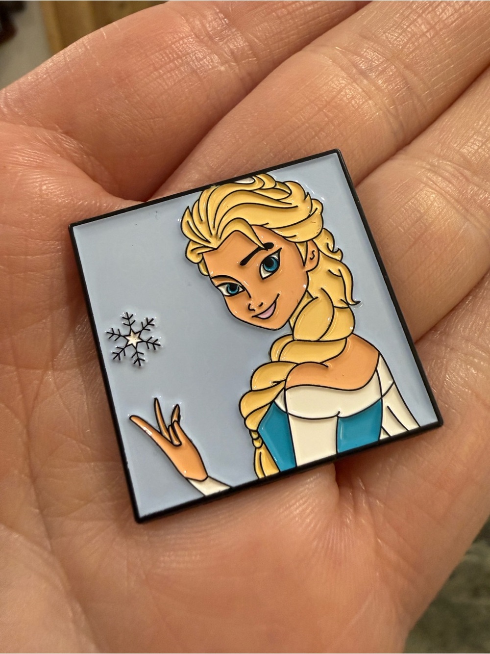 Disney Frozen Elsa-Inspired Blue and YellowEnamel Brooch with Snowflake detail